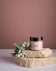 Facial Sugar Scrub on top of stones