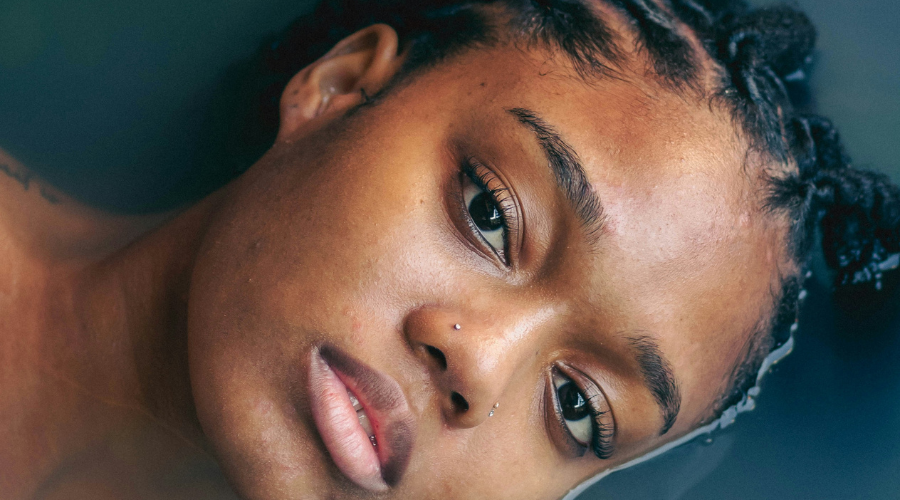 Woman laying in hair reduction spa