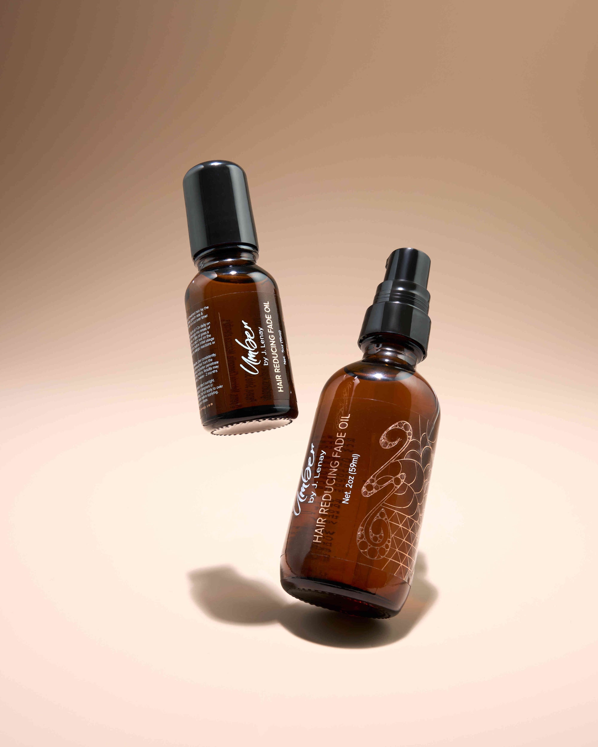 2 bottles of Hair Reducing Fade oil with different sizes
