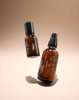 2 bottles of Hair Reducing Fade oil with different sizes